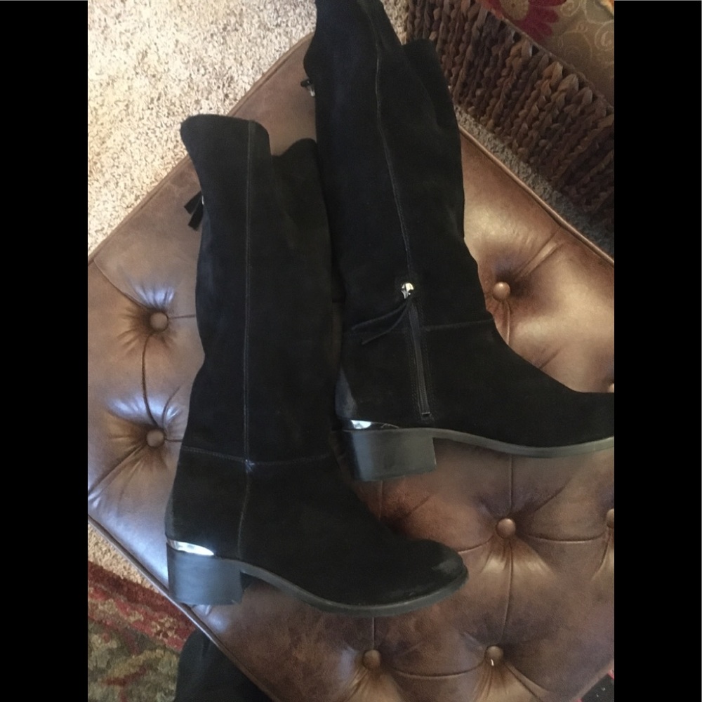 Tall black suede boots